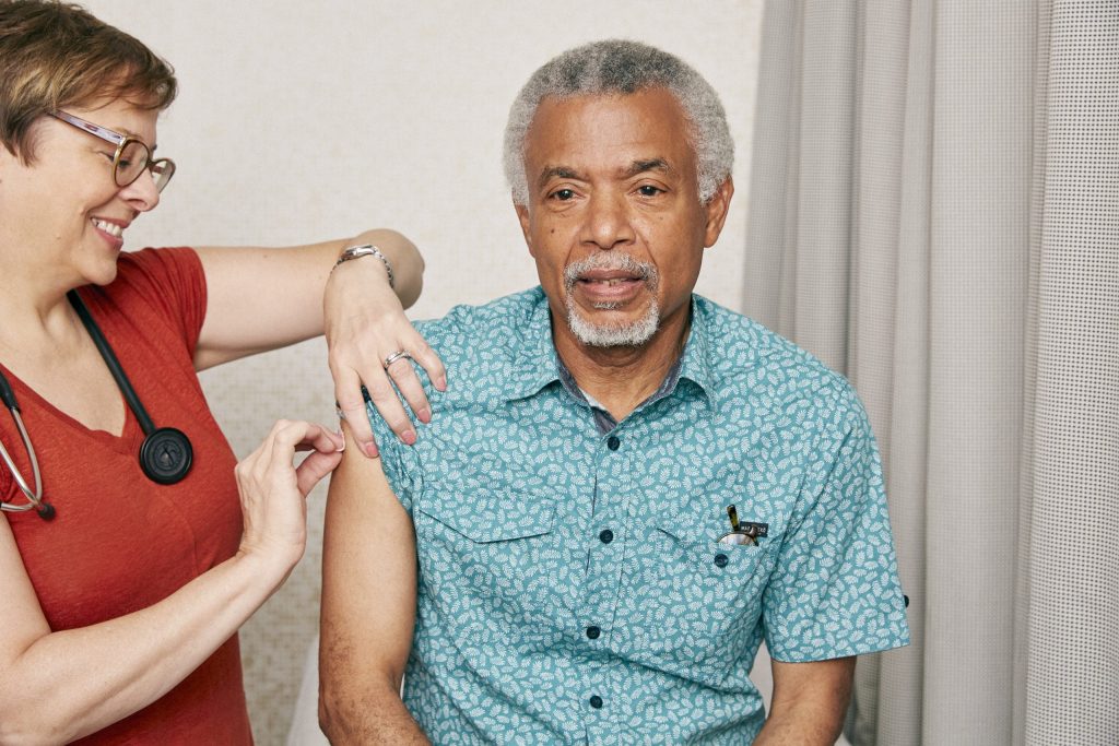 older-man-about-to-receive-a-vaccine-from-a-doctor_48545999642_o